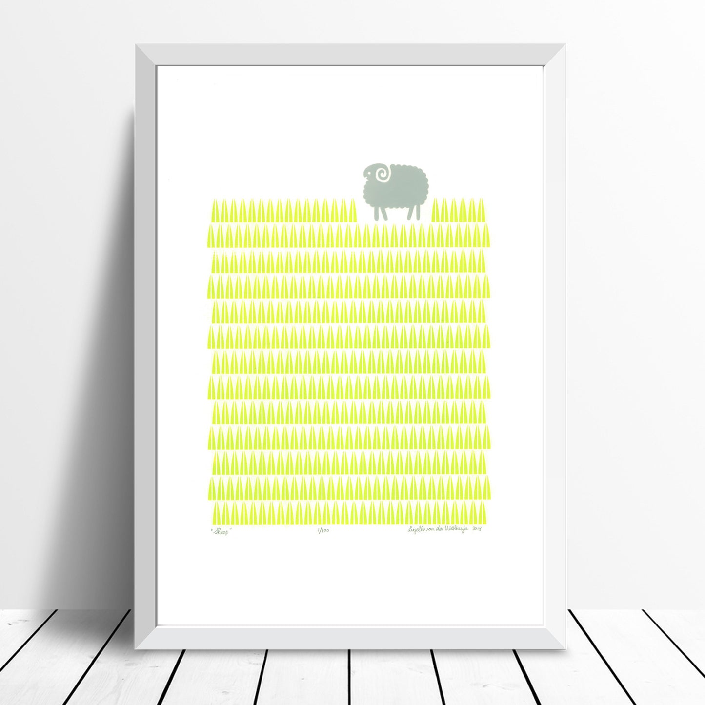 Scandinavian style graphic landscape print of a little sheep in a bright green grass meadow. A modern and playful addition to a well-designed baby nursery.