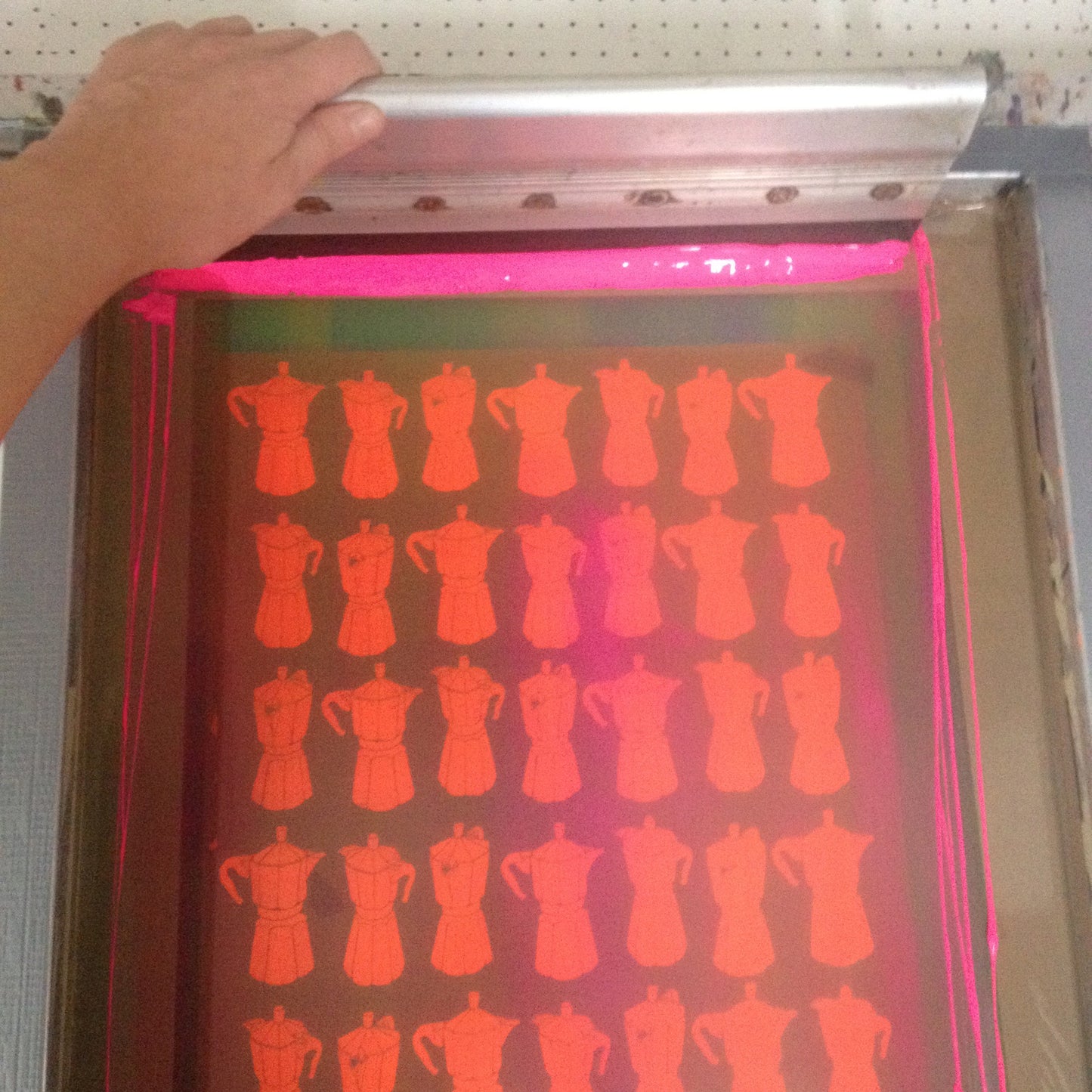 Retro style graphic pattern print of the classic Italian stovetop coffeemaker in bold neon pink. This simply illustrated art print is playful and modern.