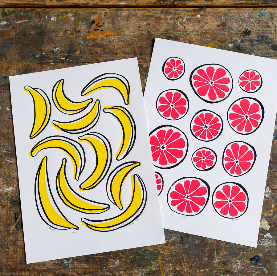 Graphic illustrated yellow and black pop art inspired banana print. A striking and retro inspired fruit print to brighten up your home.