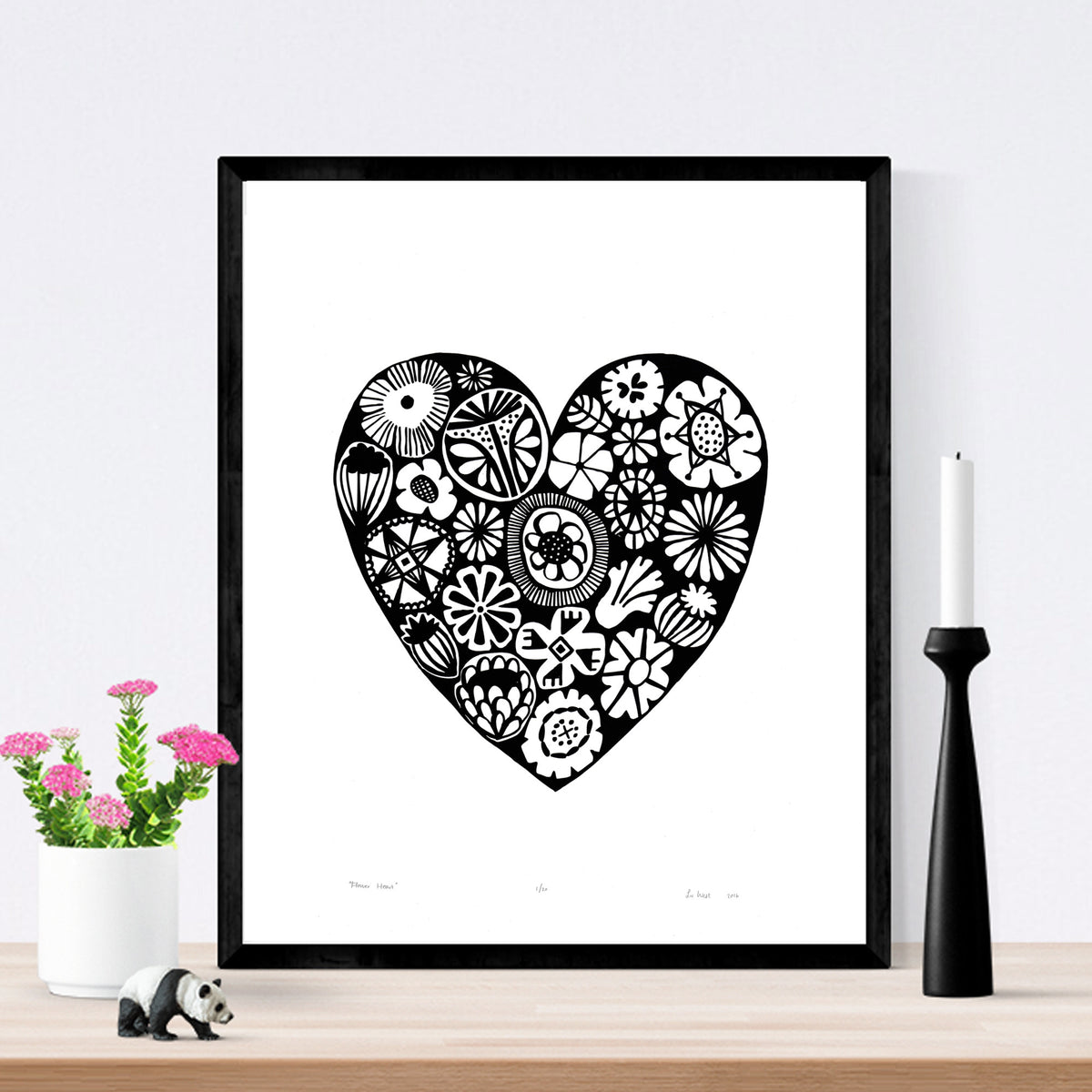 Botanical heart shaped print in monochrome black with simple Scandinavian style patterns. Inspired by the indigenous Fynbos flowers of South Africa.