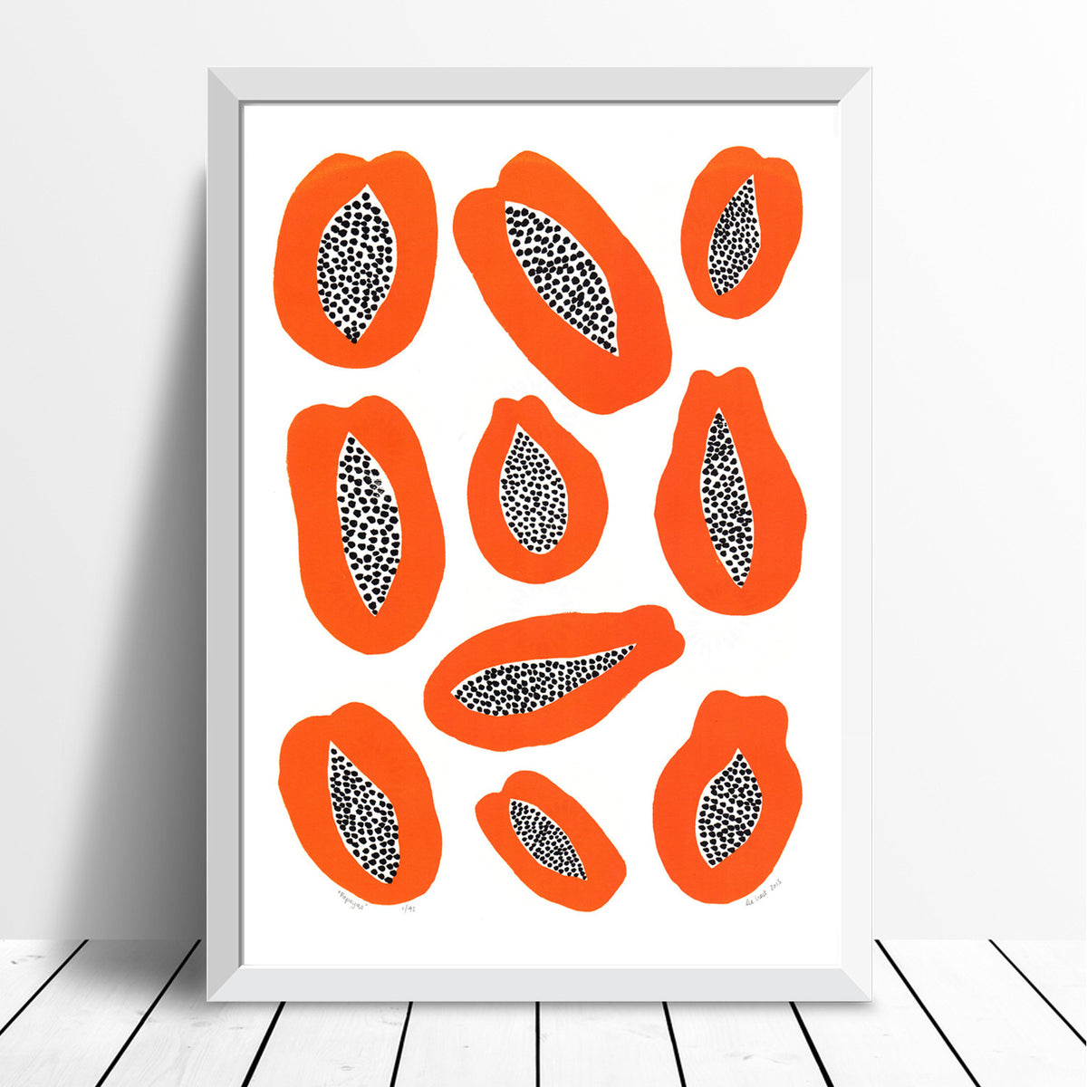 Illustrated Scandinavian style print of juicy Papayas. The simple shapes of the tropical fruit in warm burnt orange creates contrast with the dotty black seeds.