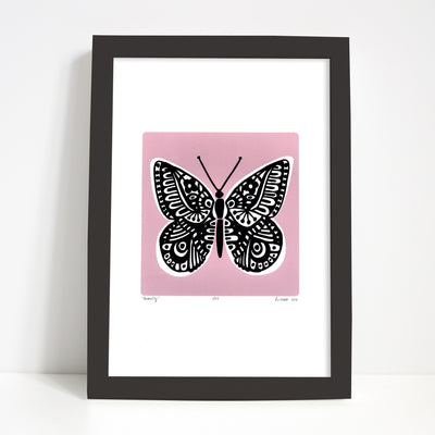 Graphic illustrated black butterfly with on trend pastel powder pink. The sugary hue of this limited edition art print will add romantic charm to your space.