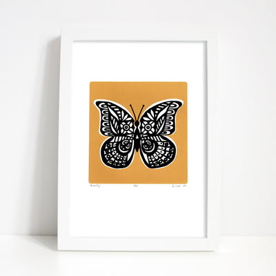 Graphic botanical butterfly print with rich and spicy saffron hue. Add a hit of statement golden yellow sunshine to your home with this limited edition artwork.