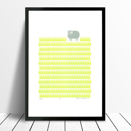 Scandinavian style graphic landscape print of a little sheep in a bright green grass meadow. A modern and playful addition to a well-designed baby nursery.