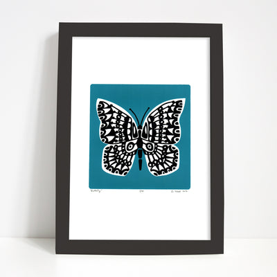 Botanical butterfly print with contemporary slate teal and black details. The strong blue-green hue of this silkscreen print will restore balance in your home.