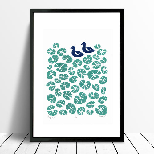 Delightful print of midnight blue ducks in a pond of green floating water lilies. The simple botanical patterns will bring a sense of calm to your home.
